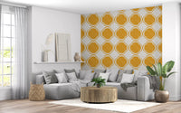 Yellow geometric wallpaper featured in entryway.