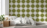 Mediterranean green geometric wallpaper styled in cozy bedroom feature area