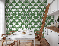Frond Rhythm green palm wallpaper adding a relaxing touch to a bright Kitchen.