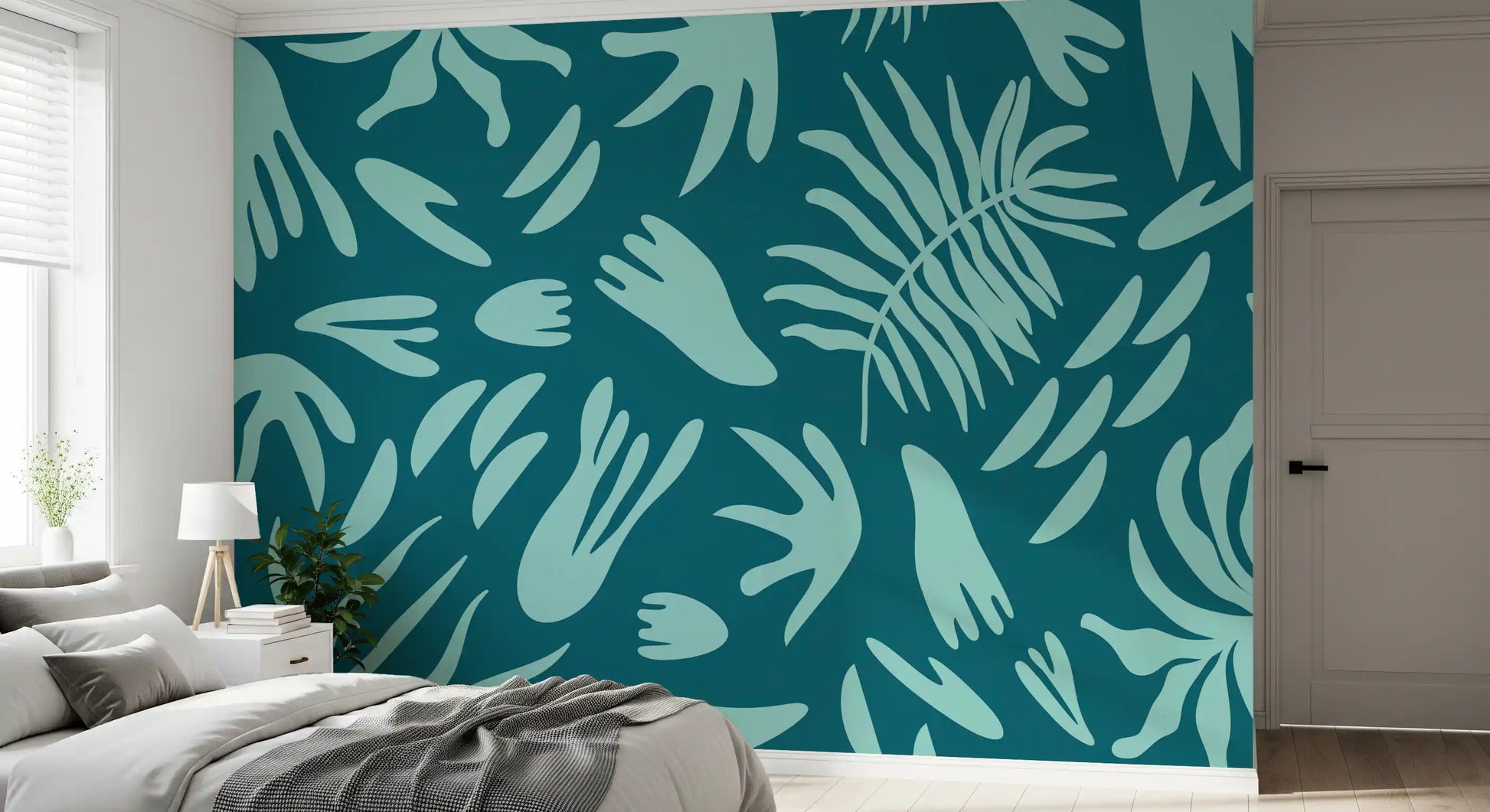 Botanical wall mural with layered leaf silhouettes and bold contrast