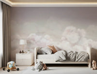 Cloud-themed wall mural with blush tones and light airy composition