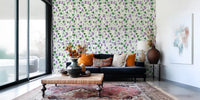 Watercolor violets wallpaper with purple blooms and green foliage pattern