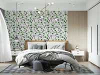 Bedroom styled violet floral wallpaper with green leaves on neutral background