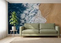 Living room wall mural with sea vs land shoreline contrast and foamy surf detail
