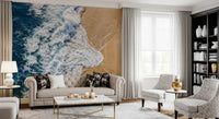 Entryway wall mural capturing sea vs land rhythm with bold coastal divide lines