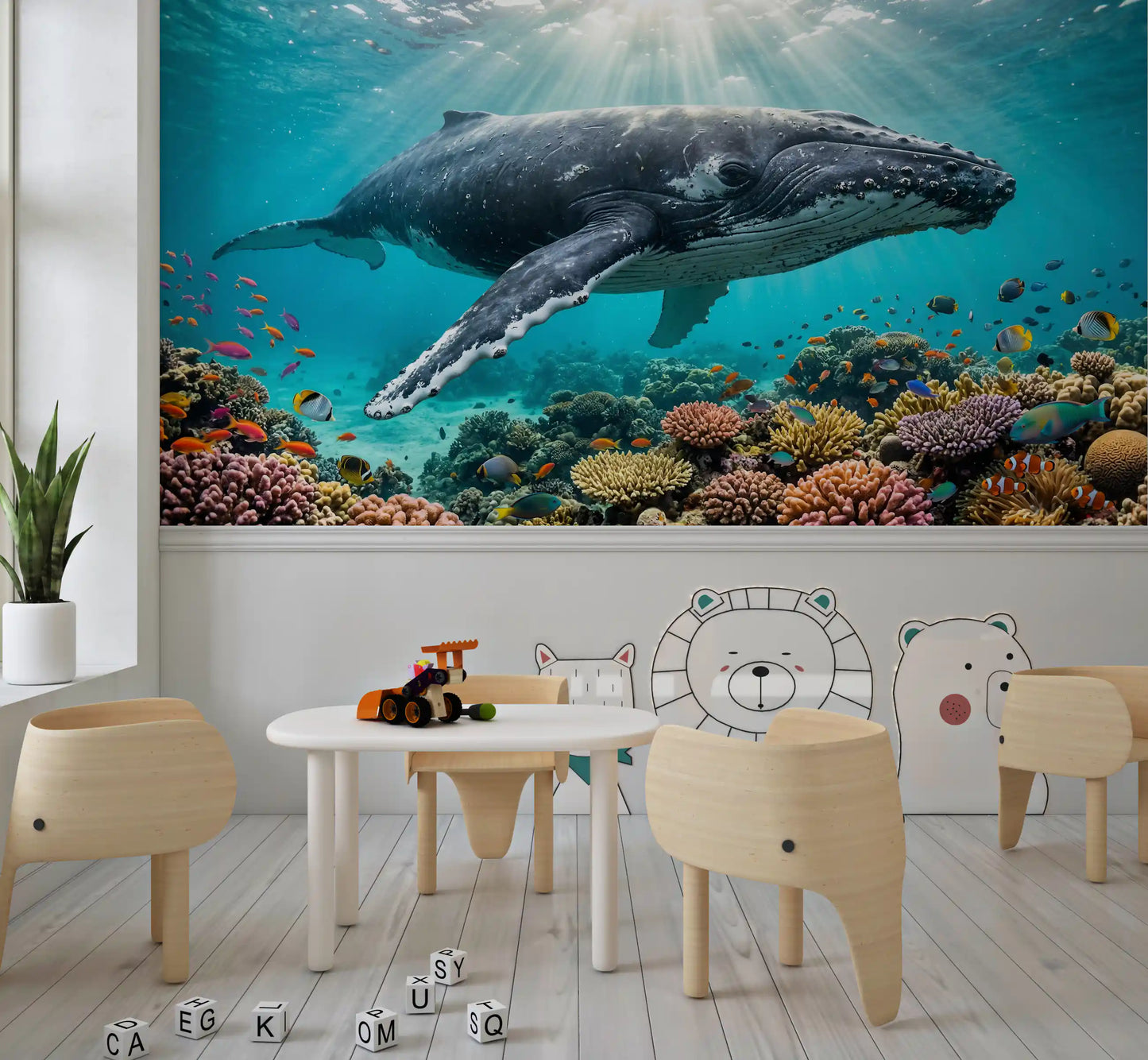 Seen in the Teen room, tropical whale mural adds rich coral reef depth below view