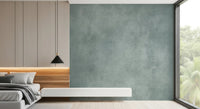 Blue green texture wall mural in a bedroom with faded paper effect