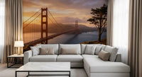 Warm coastal bridge scene wall mural styled within a cozy Living room setting
