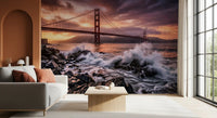 Lounge area wall mural with sunset waves and iconic bridge silhouette