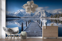 Lounge area wall mural with alpine lake and frozen peak scenery