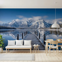 Entryway area wall mural with alpine landscape and reflective snow peaks