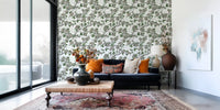 Cherry Blossom on White wallpaper with green leaves and blossom clusters