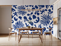 Contemporary Wall Mural in blue with palm leaves and clipped motifs