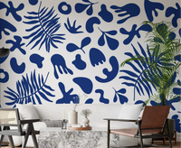 Living room with Blue Clipped Garden wall mural and bold botanical shapes