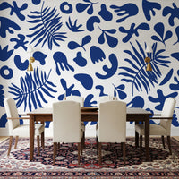 Dining room showing Blue Clipped Garden mural in graphic botanical style