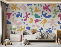 Kids room with Whimsical Happy Paws wall mural in colorful abstract shapes