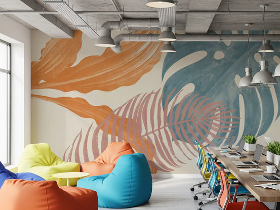 Office with rust, teal, and mauve leaves on the Tropical Leaves Muted wall mural.