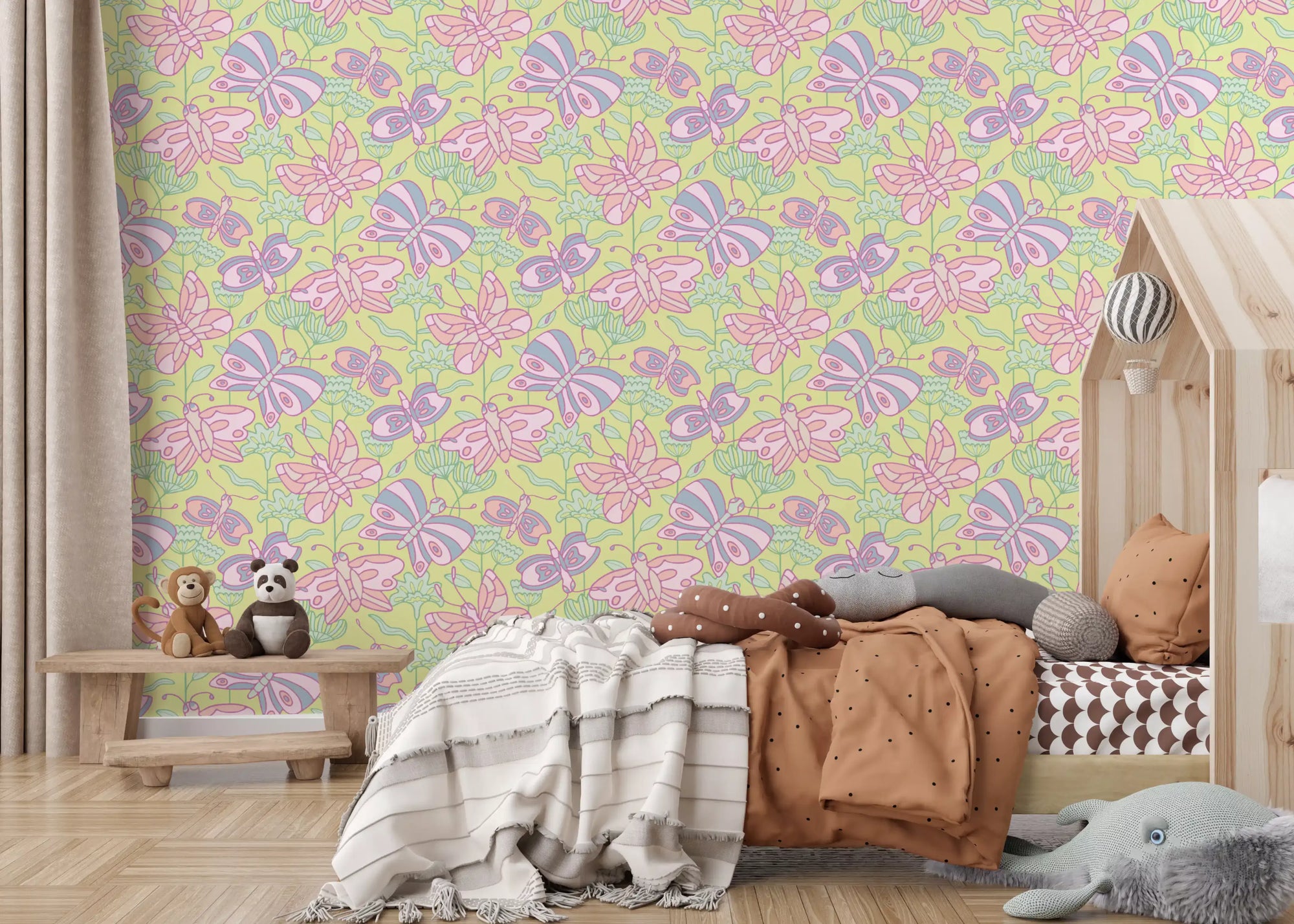 Soft cottagecore butterfly wallpaper brings pastel detail to a bedroom