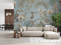 Living room wall featuring Tropical Birds Serenity mural with leaf details