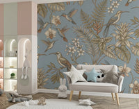 Blue botanical wall mural with layered foliage and bird illustrations