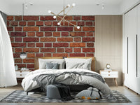 Uneven brick faces give this red brick texture wall mural depth