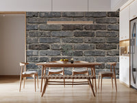 Brickwork texture wall mural in urban gray with weathered brick detail