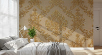 Bedroom styled using floral gold wall mural with ornate design