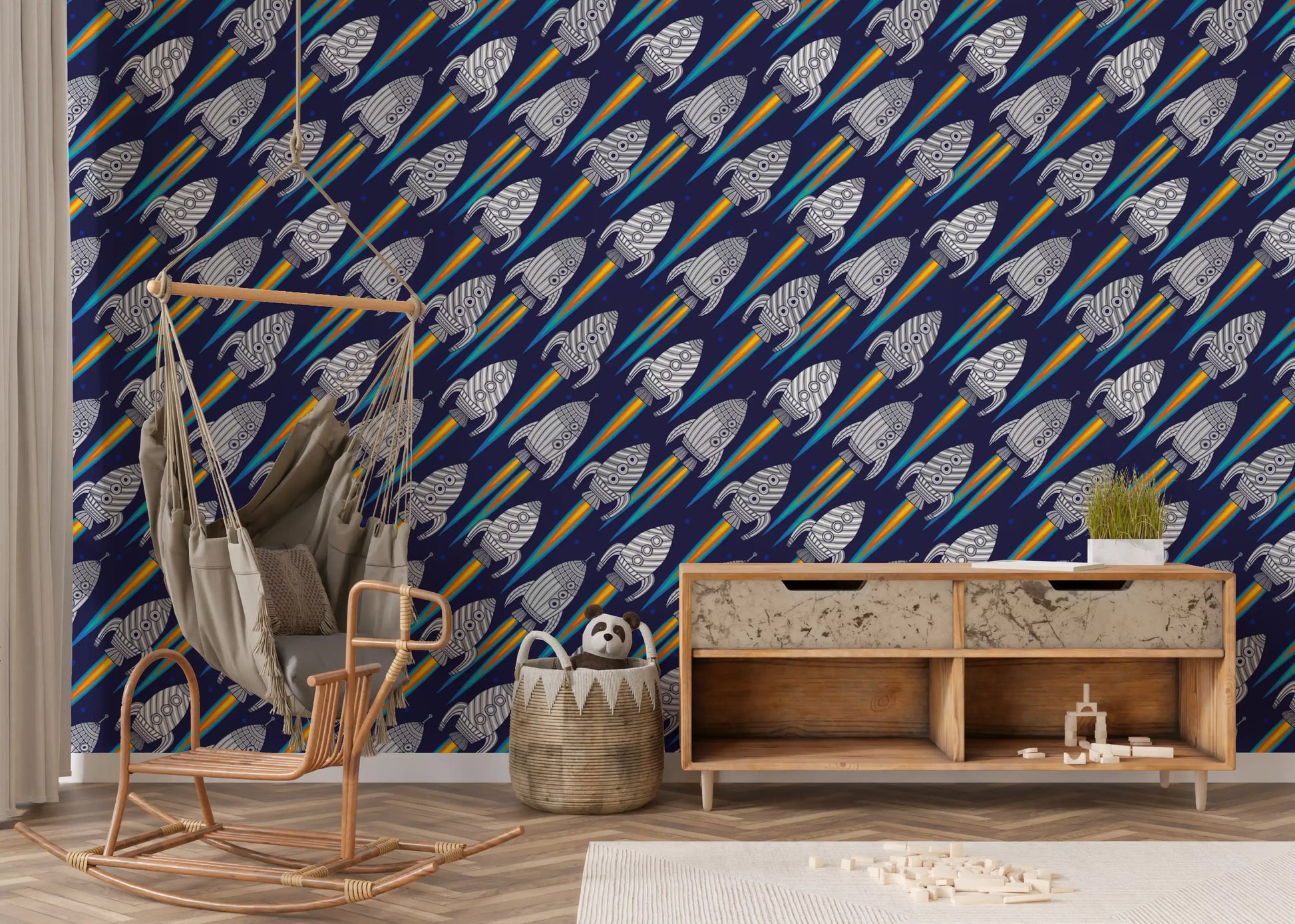 Play area styled with rockets spaceships wallpaper on dark blue base