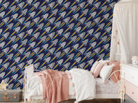 Girls room with kids spaceship wallpaper and rainbow rocket trails