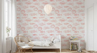 Coral White Wallpaper brings hand-drawn fish outlines to a bedroom wall
