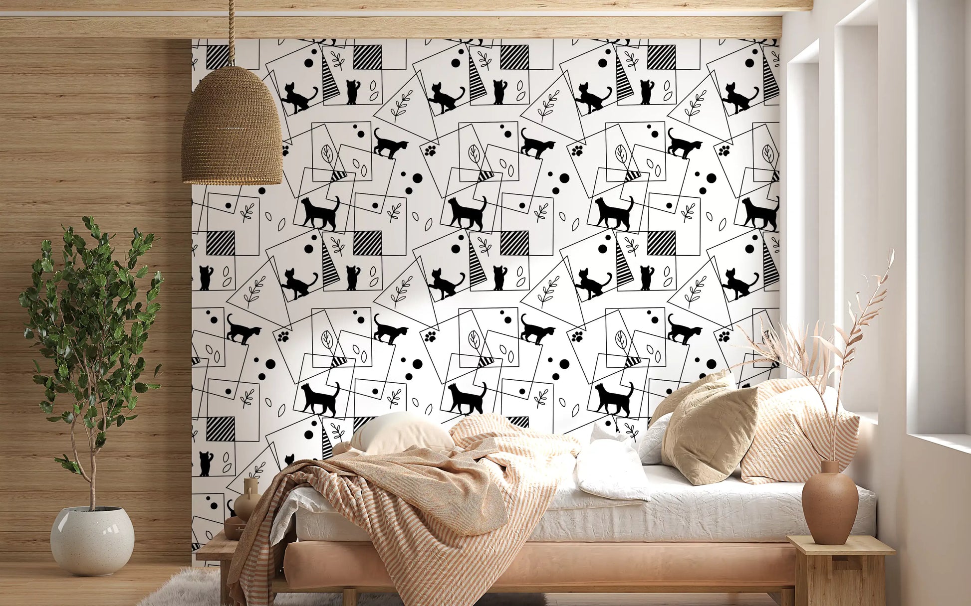 Bedroom lined with Geometric Cats wallpaper of cat shapes and squares
