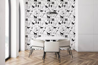 Dining room wall finished in Geometric Cats wallpaper monochrome print
