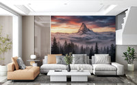 Misty mountain wall mural with dark pine trees and a glowing summit sky