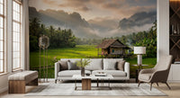 Low mist softens this green valley wall mural with mountain silhouettes