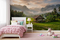 Rice paddy wall mural with palm trees, water channels, and cloudy peaks