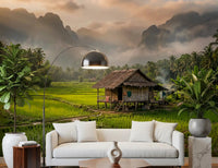 Living room with Misty Mountain Rice Fields Wall Mural and green paddies