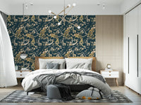 Graceful birds and floral sprigs shape this dark navy wallpaper design