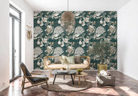 Cream chrysanthemums and palm fronds on forest green floral wallpaper