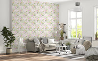 Scattered pink flowers and green foliage in summertime pattern wallpaper