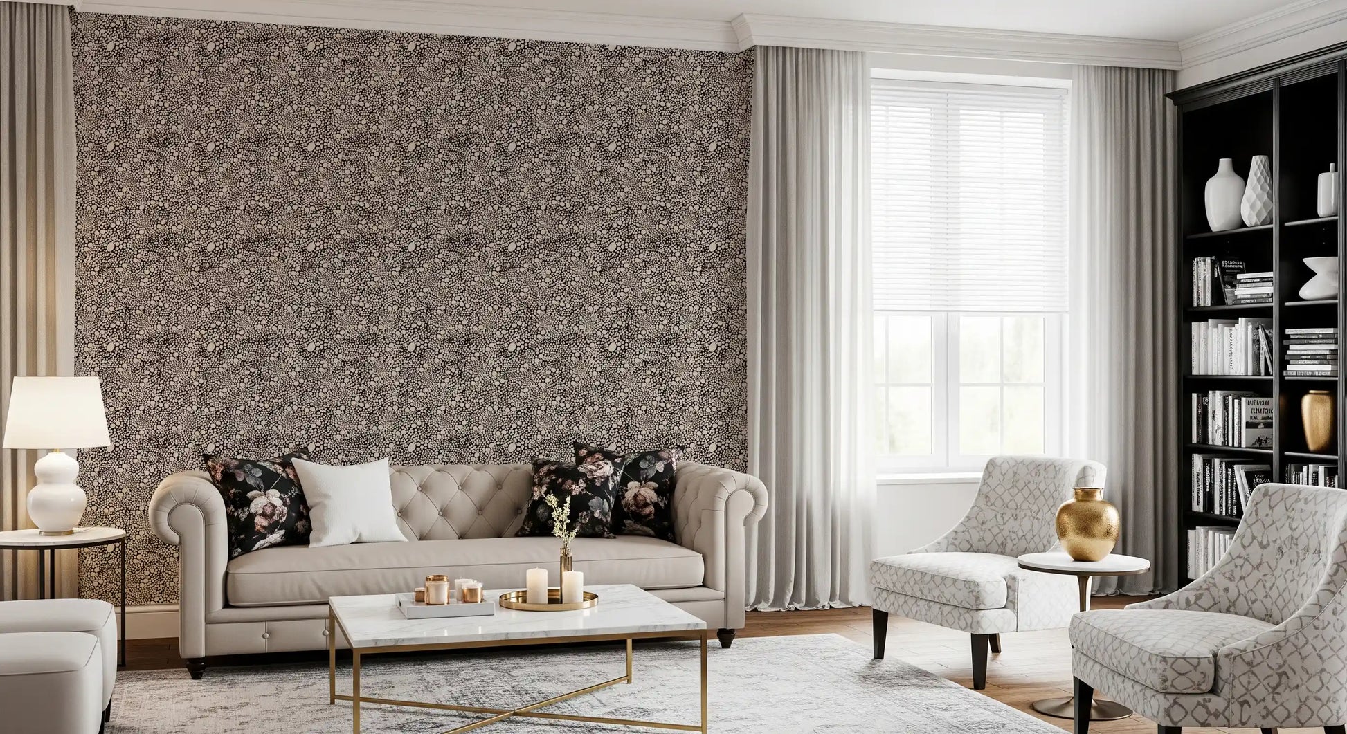 Cream-ivory pebbles float over a dark base on this organic textured wallpaper