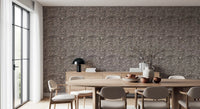 Organic dot clusters swirl and shift across this rustic textured wallpaper surface