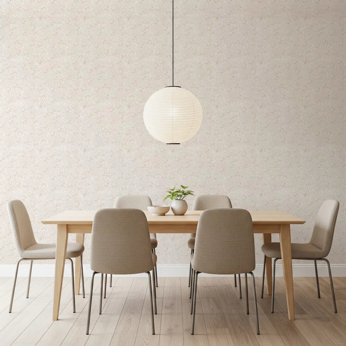 Pebble dust wallpaper in warm beige tones with flowing dot clusters