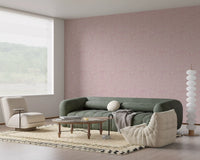 Irregular dot variation across Pebble Bloom pink wallpaper in a matte ground