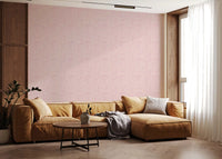 Full swatch of Blush Pebble wallpaper in dusty pink with cream dot texture