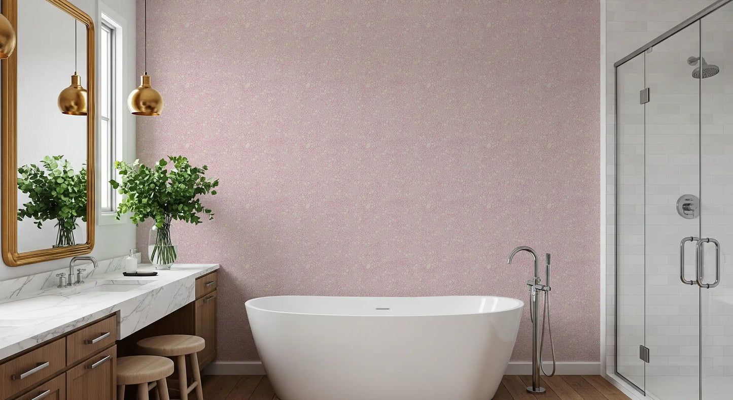Muted blush Pebble Bloom wallpaper spreading across this bathroom 