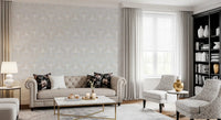 Bird and bloom motifs woven through the Cottagecore Pastel wallpaper surface