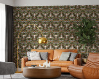 Living space styled with olive and cream botanical wallpaper backdrop
