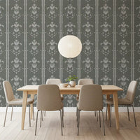 Off-white florals dot the Dining room across Cottagecore Gray Botanical wallpaper.