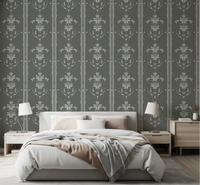 White damask stripes trace the bedroom on Cottagecore Gray Botanical wallpaper.