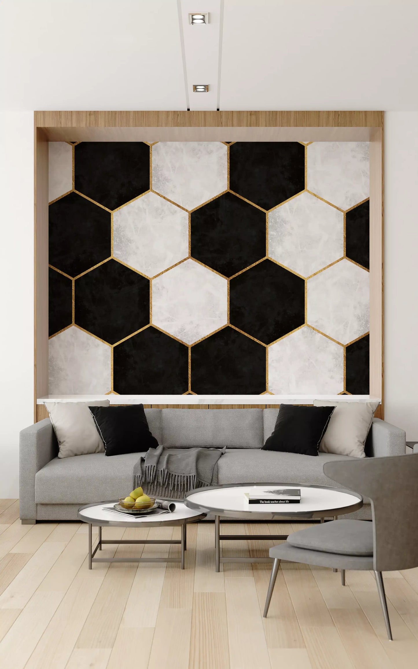 Black and gold honeycomb wall mural anchoring a refined Living room setting